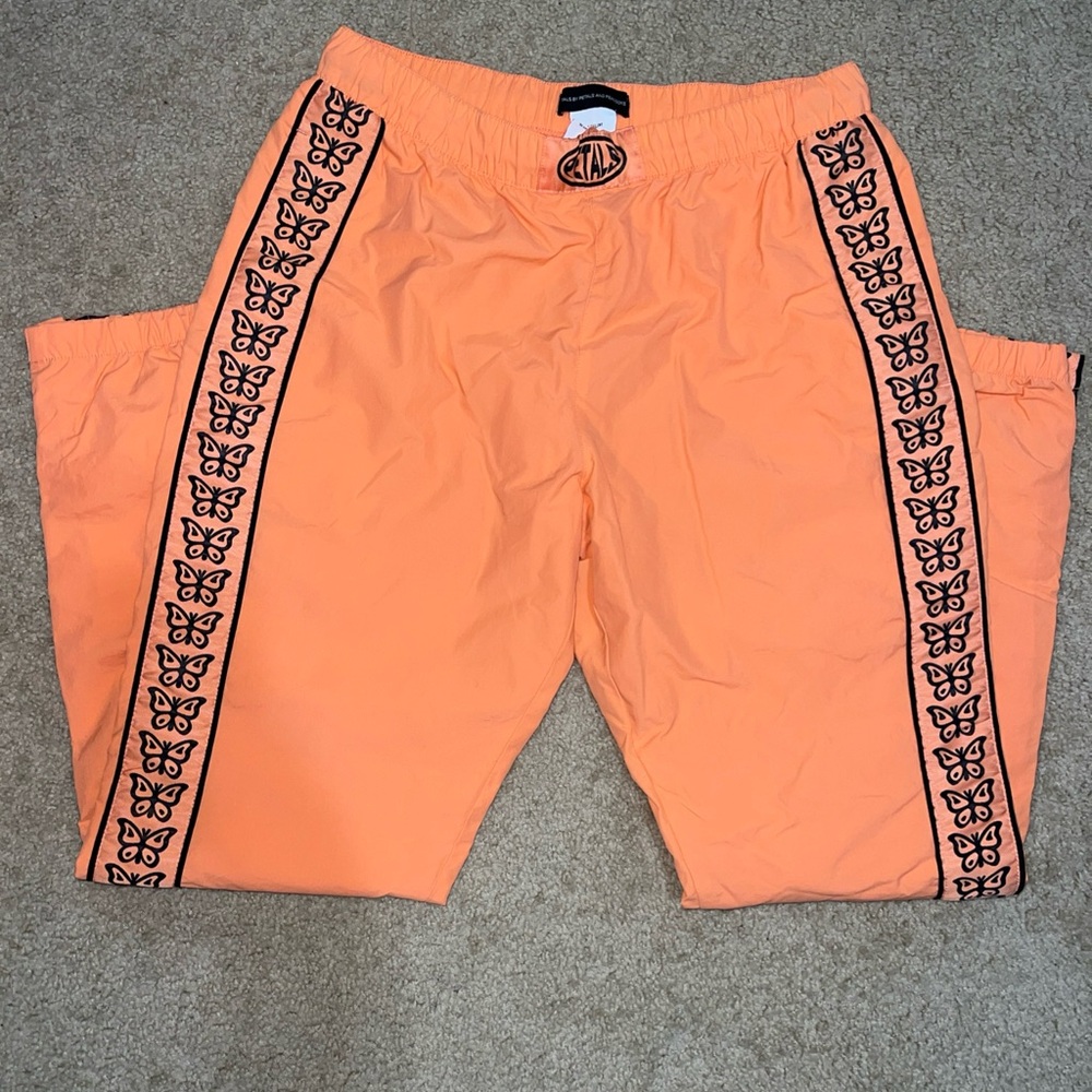 Orange Track Pants with Butterfly Design